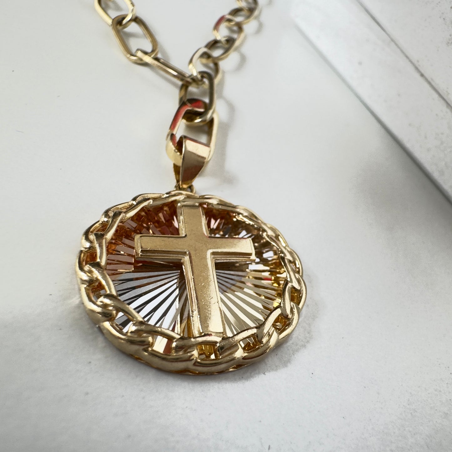 14k Yellow Gold Cross on Round Pendant.