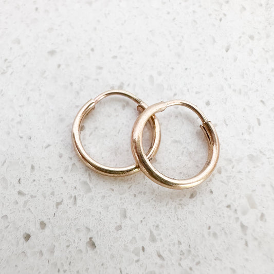 Mini Huggie Hoop 10K yellow Gold