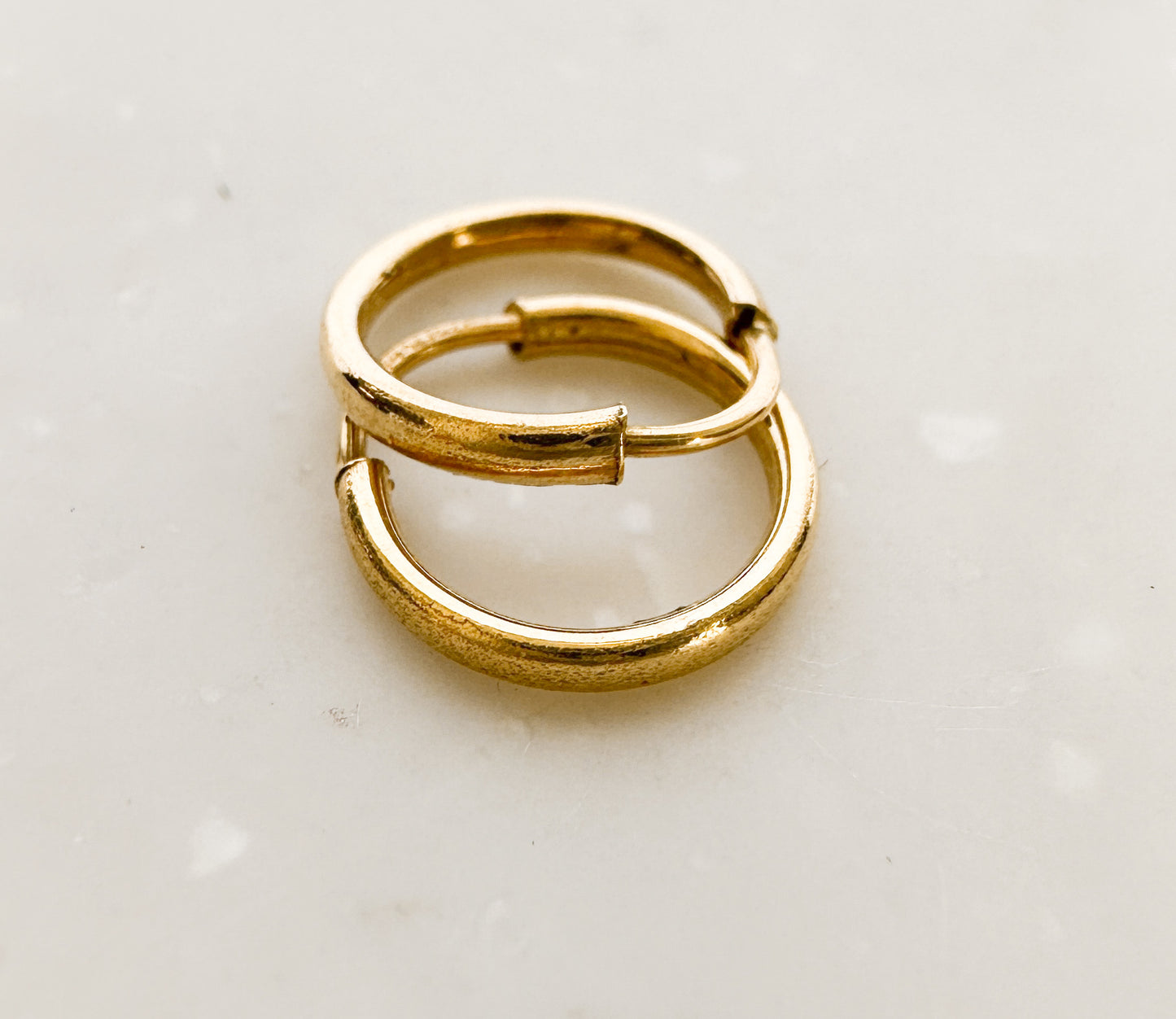 Mini Huggie Hoop                          10K yellow Gold