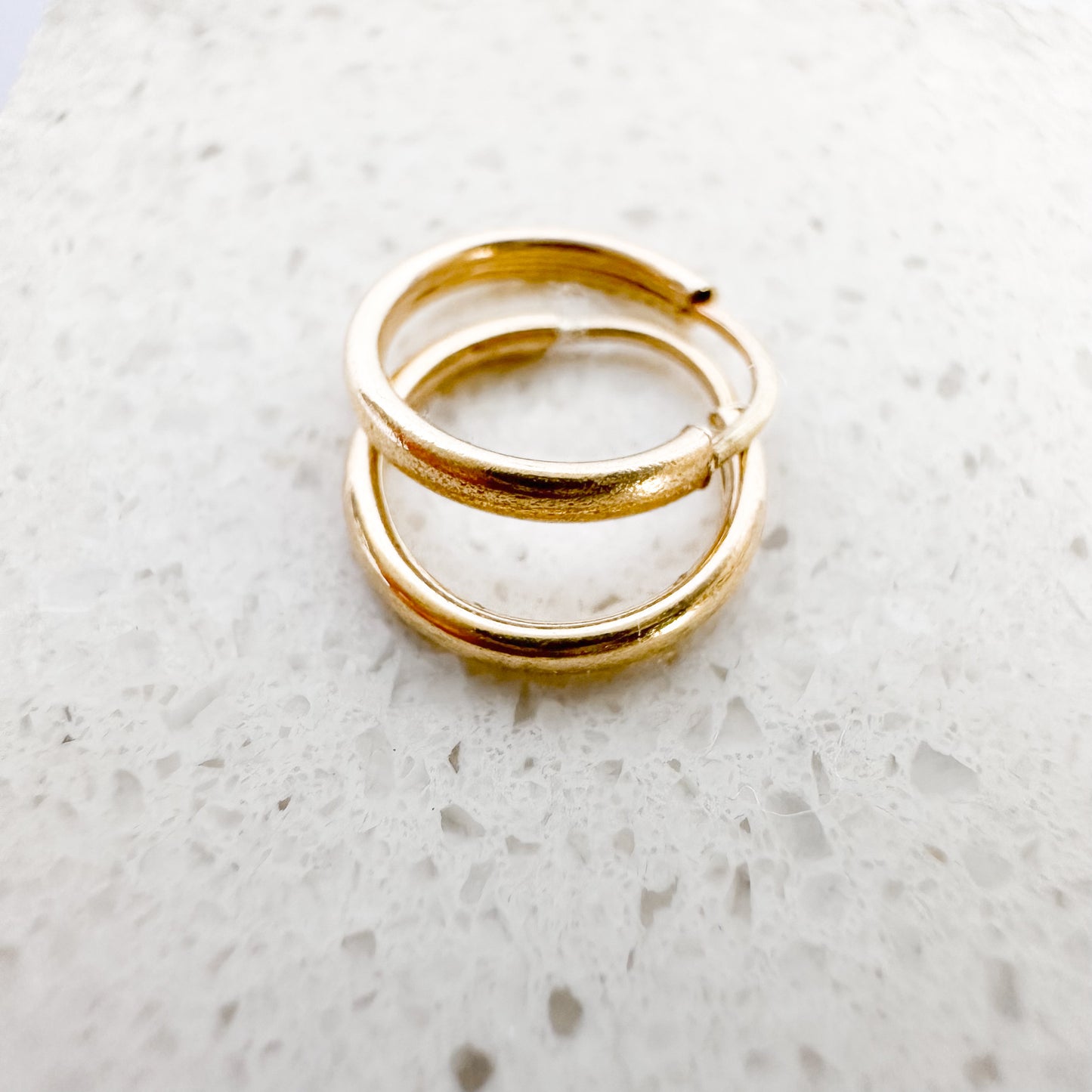 Mini Huggie Hoop                          10K yellow Gold