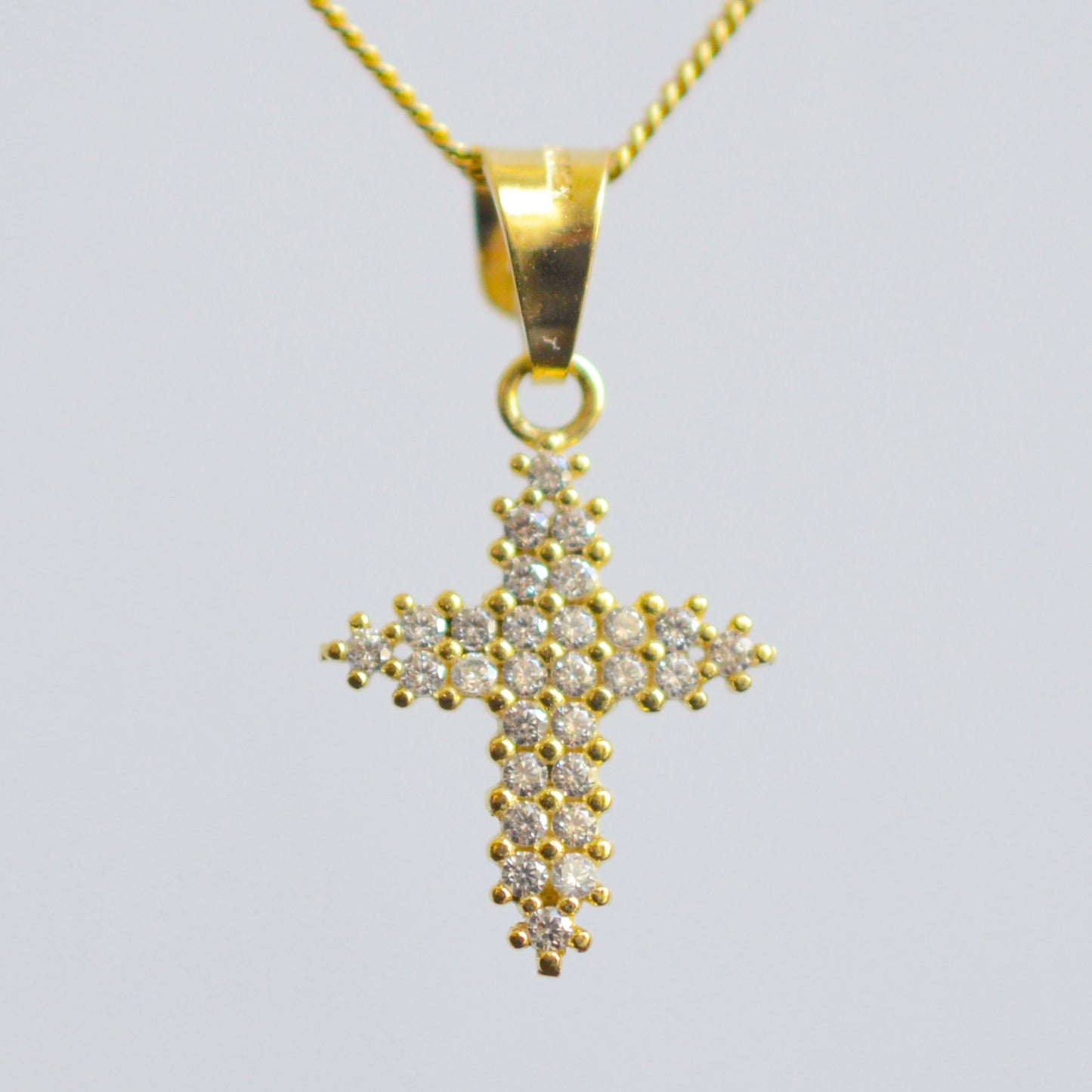 Cross Pendant adorned with Zirconia  10K Solid Yellow Gold